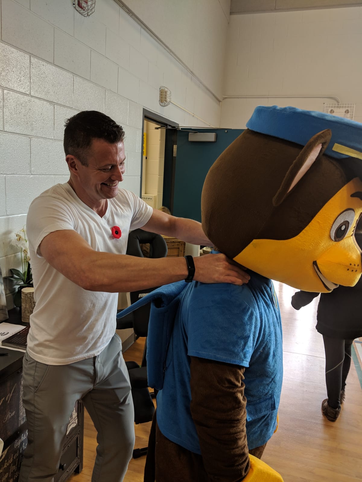 Kevin treating a Paw Patrol mascot character